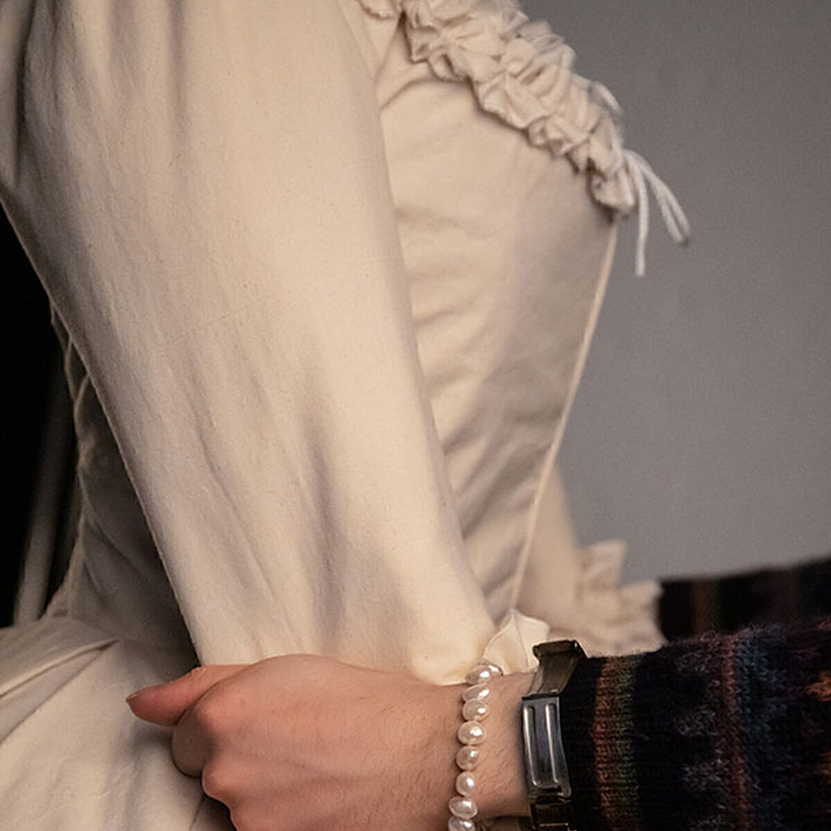 A tailor working on a with cotton dress