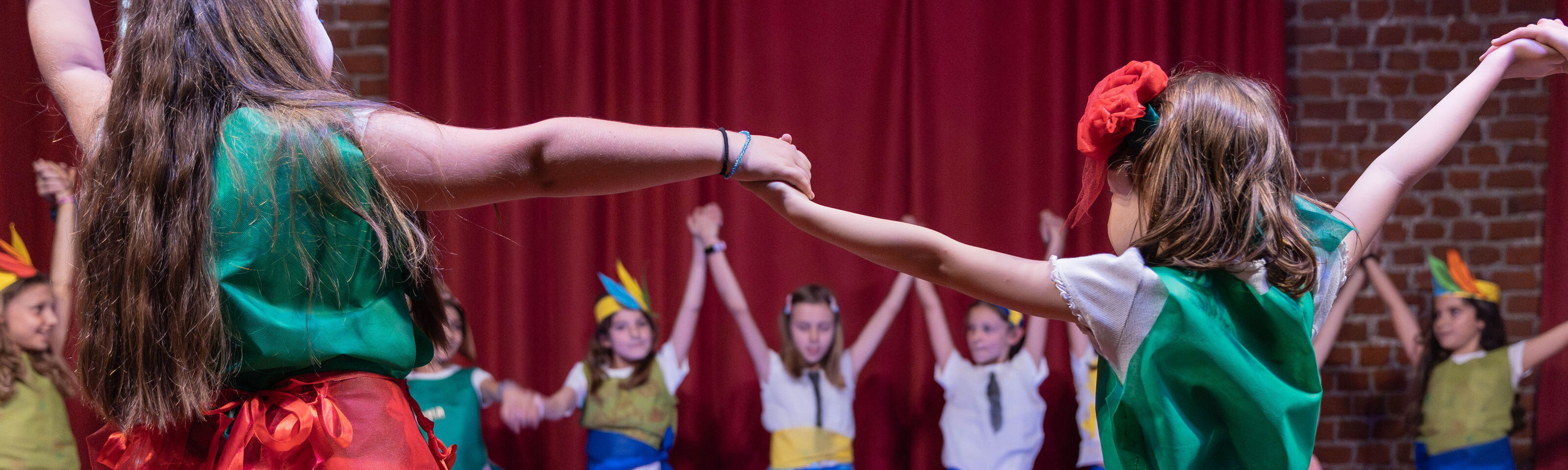 Some children preparing a theatrical performance